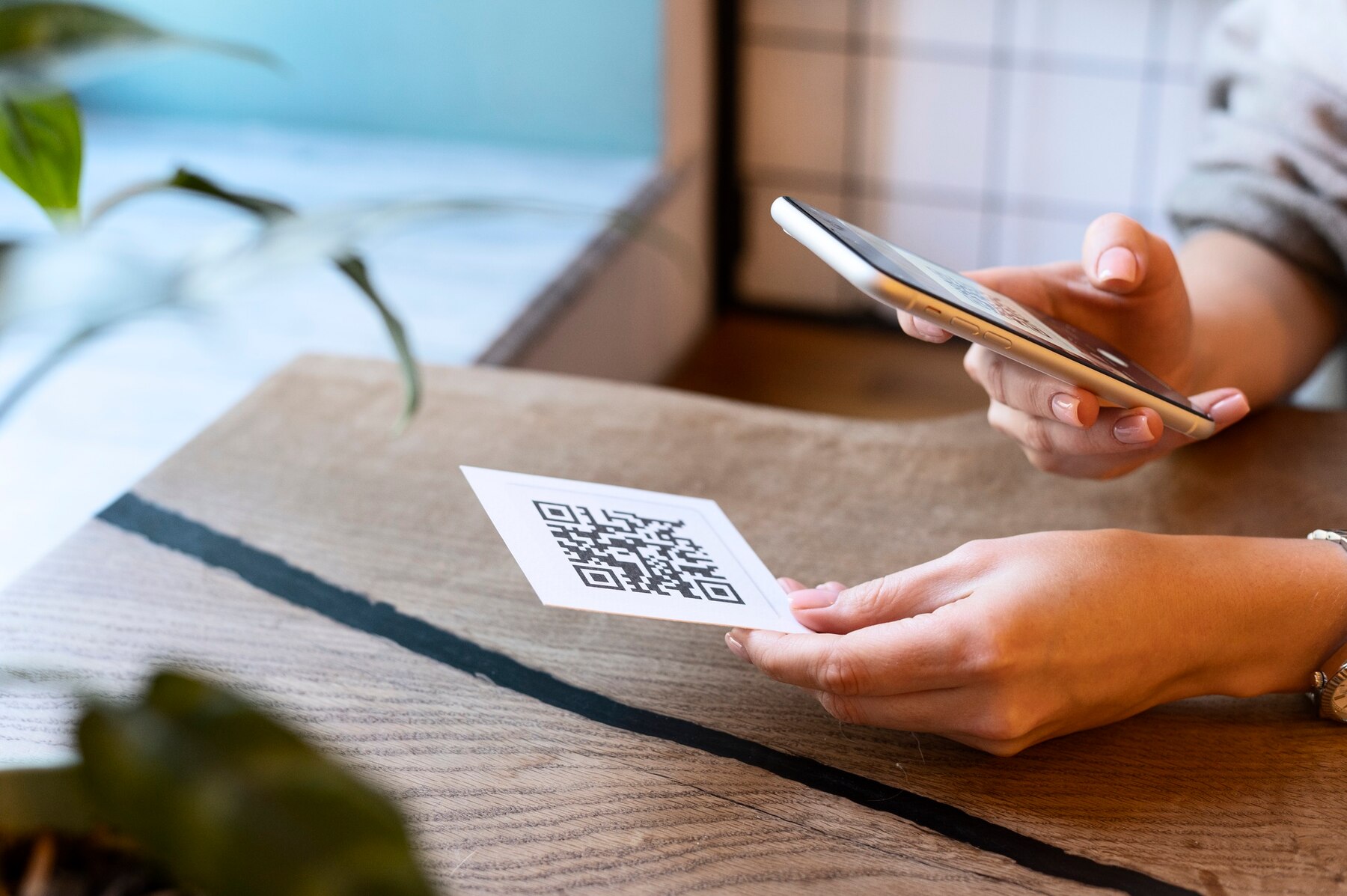 QR code being scanned on a phone, showcasing QR code marketing in action